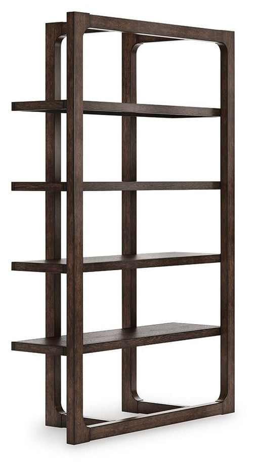 Ashley Furniture Breckington 76-inch wood bookcase with multiple shelves and a warm finish, shown from an angled side view.