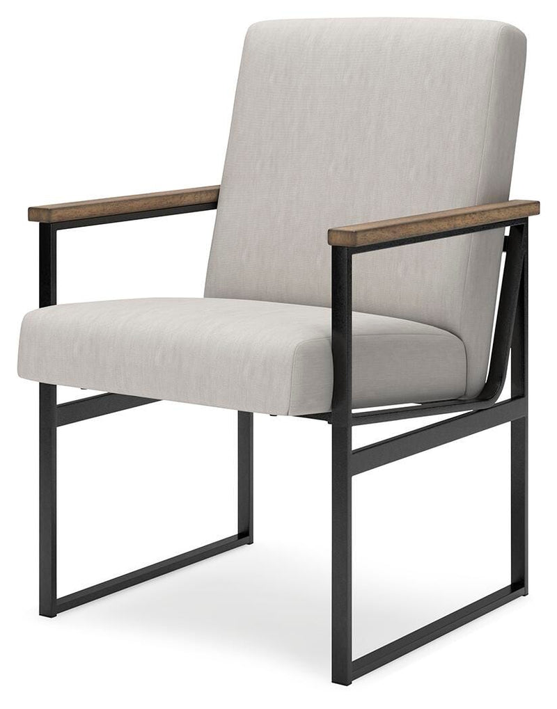Ashley Furniture Montia home office set with desk, chair, and storage, shown from an angled view.