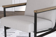 Ashley Furniture Montia home office set with desk and storage shelves, featuring a modern design and wood finish.