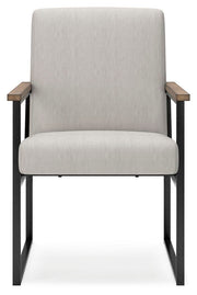 Ashley Furniture Montia Home Office Set with desk and chair, modern design, dark wood finish, and ergonomic details.