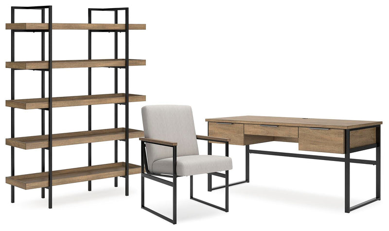 Ashley Furniture Montia home office set with desk and chair, featuring a modern design in a workspace setting.