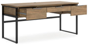 Ashley Furniture Montia Home Office Set with desk and shelves, shown from an angled open view.