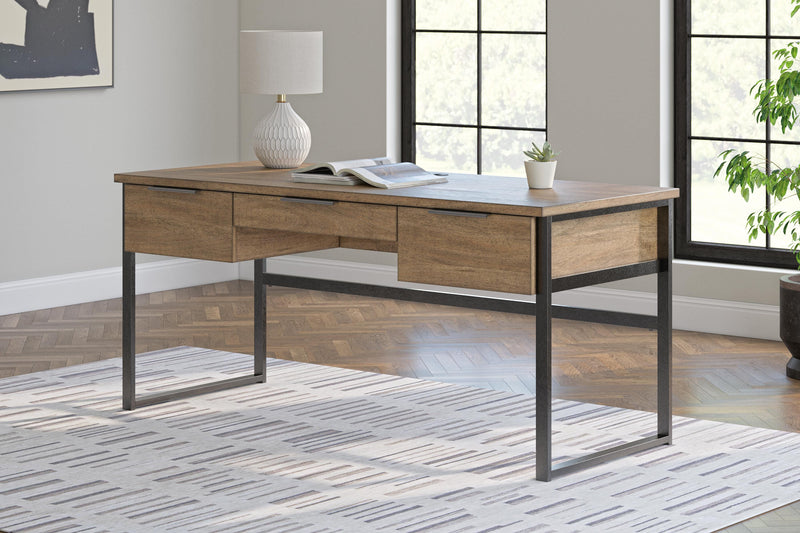 Ashley Furniture Montia Home Office Set with desk, chair, and storage, featuring modern design and warm wood finish.
