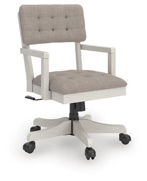 Ashley Furniture Robbinsdale home office desk chair with cushioned seat and backrest, shown from an angled side view.
