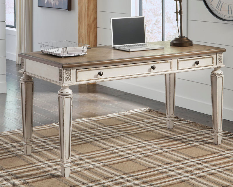 Ashley Furniture Realyn Home Office Set with desk, chair, and storage components arranged in a modern workspace layout.