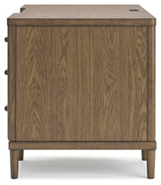 Ashley Furniture Roanhowe Home Office Set with desk, chair, and storage features, shown in a modern workspace setup.