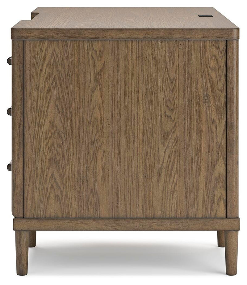 Ashley Furniture Roanhowe Home Office Set with desk, chair, and storage features, shown in a modern workspace setup.