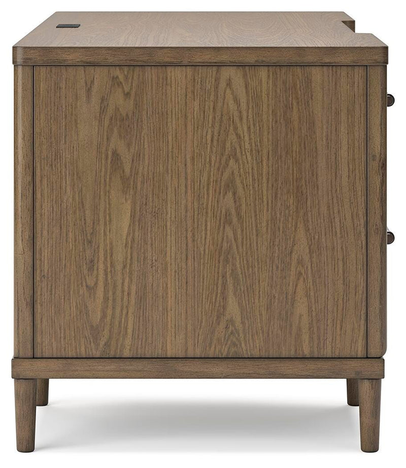 Ashley Furniture Roanhowe Home Office Set with desk, chair, and storage units arranged in a modern home office space.
