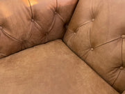 Leather swivel accent chair with tufted design and wooden legs, Model 7773L42 by Mayo Furniture, Monterrey Furniture TX
