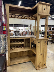 Rustic solid wood cantina bar with travertine top, handcrafted by Monterrey Furniture showcasing natural wood grain and elegant stone surface.