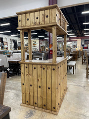 Rustic solid wood cantina bar with travertine top, crafted by Monterrey Furniture, featuring a sturdy wood construction and elegant surface.
