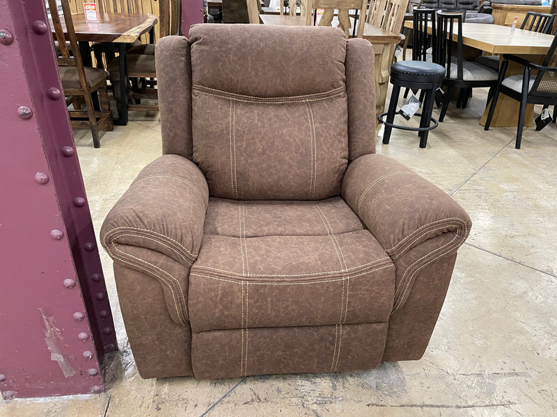 Three-piece manual reclining living room set by Generation Trade, featuring comfortable sofas and armchairs in a modern design.