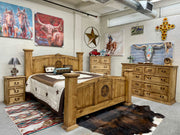 Medium dark finish Monterrey Furniture 7-drawer chest from the Mansion Collection with Texas Stars, showcasing its detailed drawer design.