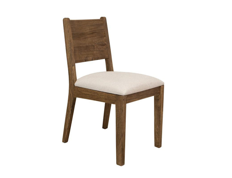 Olimpia chair by International Furniture Direct with wooden frame and upholstered seat and back in a cozy living room setting.