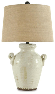 Ashley Furniture Emelda Table Lamp with a sleek ceramic base and fabric shade, perfect for modern living room decor.
