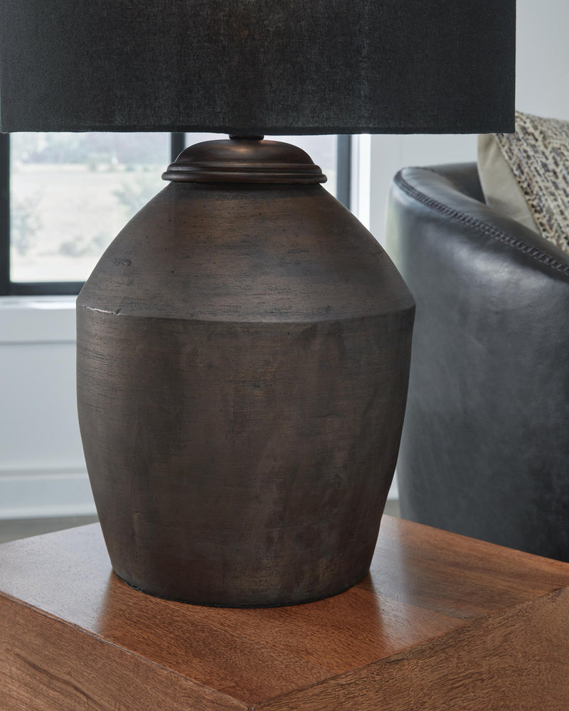 Ashley Furniture Naareman table lamp set featuring two elegant lamps with textured beige shades and sleek bases.