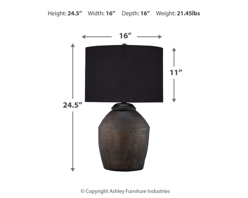 Naareman table lamp set by Ashley Furniture featuring two stylish, modern lamps with textured bases and fabric shades.