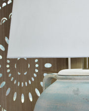 Close-up of the beige fabric lampshade from the Ashley Furniture Shawburg table lamp set, showcasing detailed craftsmanship.