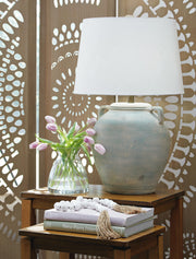 Ashley Furniture Shawburg Table Lamp Set featuring two elegant lamps with fabric shades and a modern design.