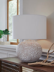 Ashley Furniture Vien table lamp with a stylish base and fabric shade, perfect for adding warm lighting to any room.