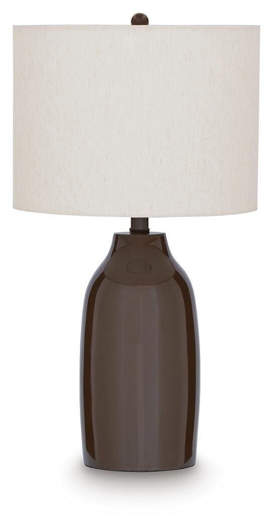 Ashley Furniture Jyler table lamp with a sleek black base and white fabric shade on a wooden side table.