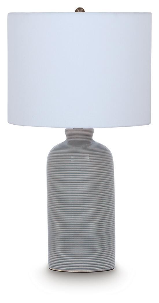 Ashley Furniture Wimlow table lamp with a sleek design, featuring a neutral-colored shade and a modern base.
