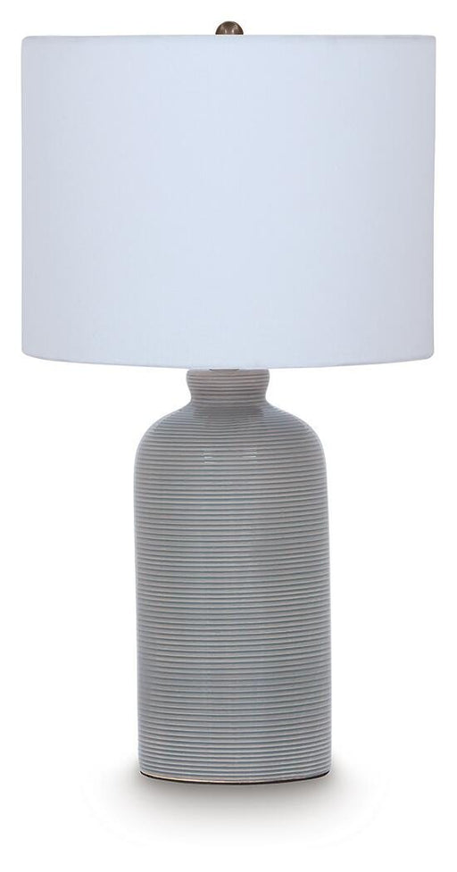 Ashley Furniture Wimlow table lamp with a sleek design, featuring a neutral-colored shade and a modern base.