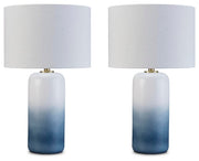 Pair of Lemrich Table Lamps by Ashley Furniture with beige fabric shades and wooden bases on a modern living room side table