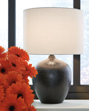 Ashley Furniture Ladstow table lamp set with two stylish lamps featuring neutral-colored shades and wooden bases.
