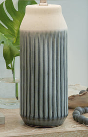 Pair of Ashley Furniture Afener table lamps with beige fabric shades and wooden bases, perfect for bedside or living room decor.