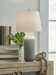 Pair of Ashley Furniture Afener table lamps with beige fabric shades and dark wood bases, perfect for bedside or living room decor.