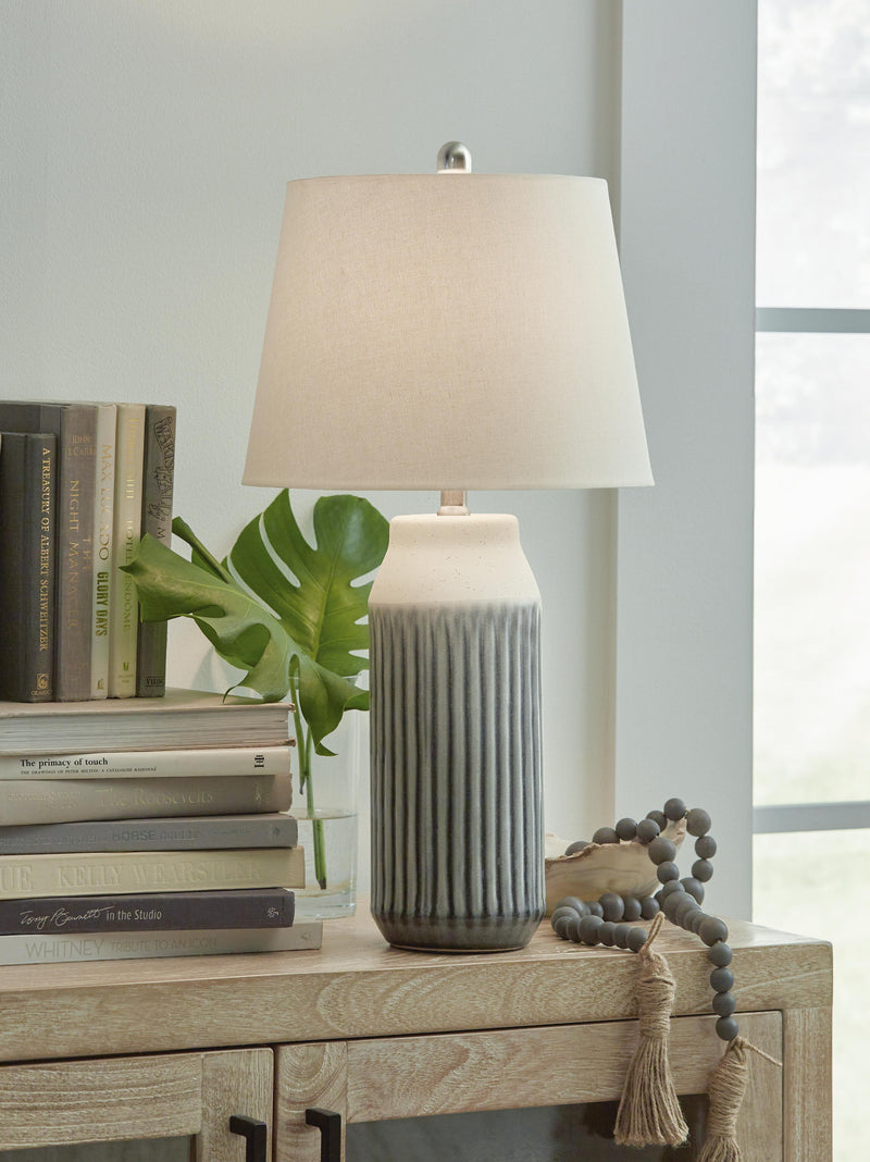 Pair of Ashley Furniture Afener table lamps with beige fabric shades and dark wood bases, perfect for bedside or living room decor.