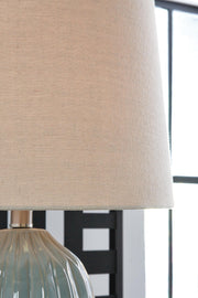 Pair of Hadbury table lamps with beige fabric shades, featuring classic design, by Ashley Furniture, shown with detailed shade close-up.
