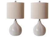 Ashley Furniture Rainermen Lamp Set with two elegant table lamps featuring neutral fabric shades and wooden bases.
