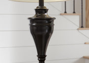 Pair of Ashley Furniture Darlita table lamps with sleek metallic finish, featuring modern design and fabric shades.
