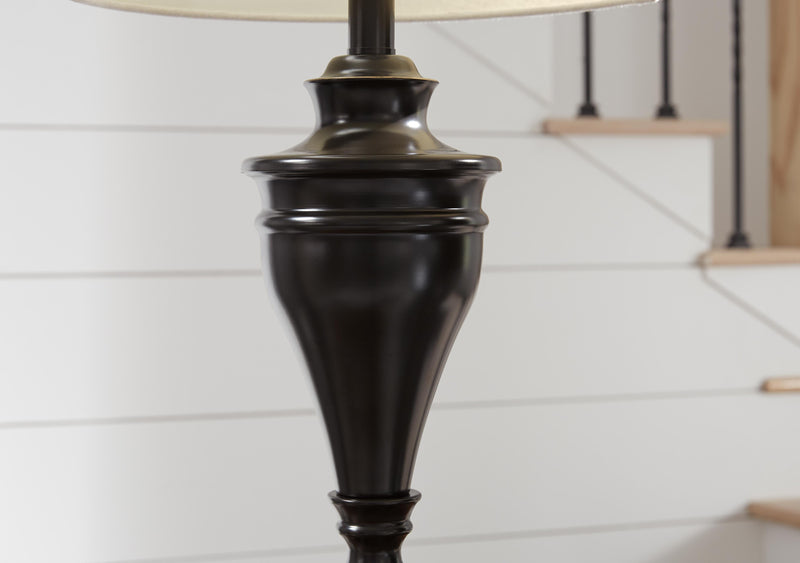 Pair of Ashley Furniture Darlita table lamps with sleek metallic finish, featuring modern design and fabric shades.