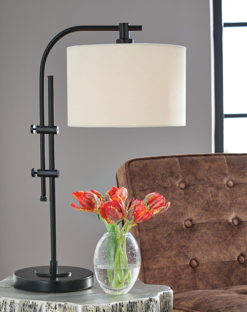 Ashley Furniture Baronvale Lamp Set featuring two elegant table lamps with neutral shades and decorative bases.