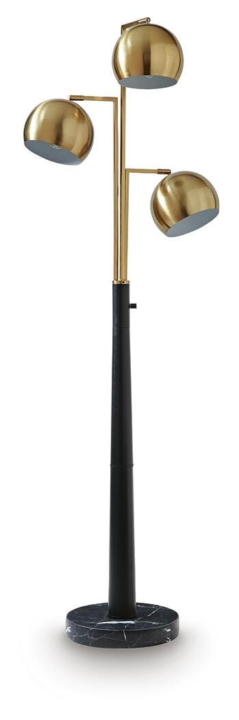 Ashley Furniture Sorcha floor lamp with a tall, sleek design and fabric shade, standing on a wooden floor.