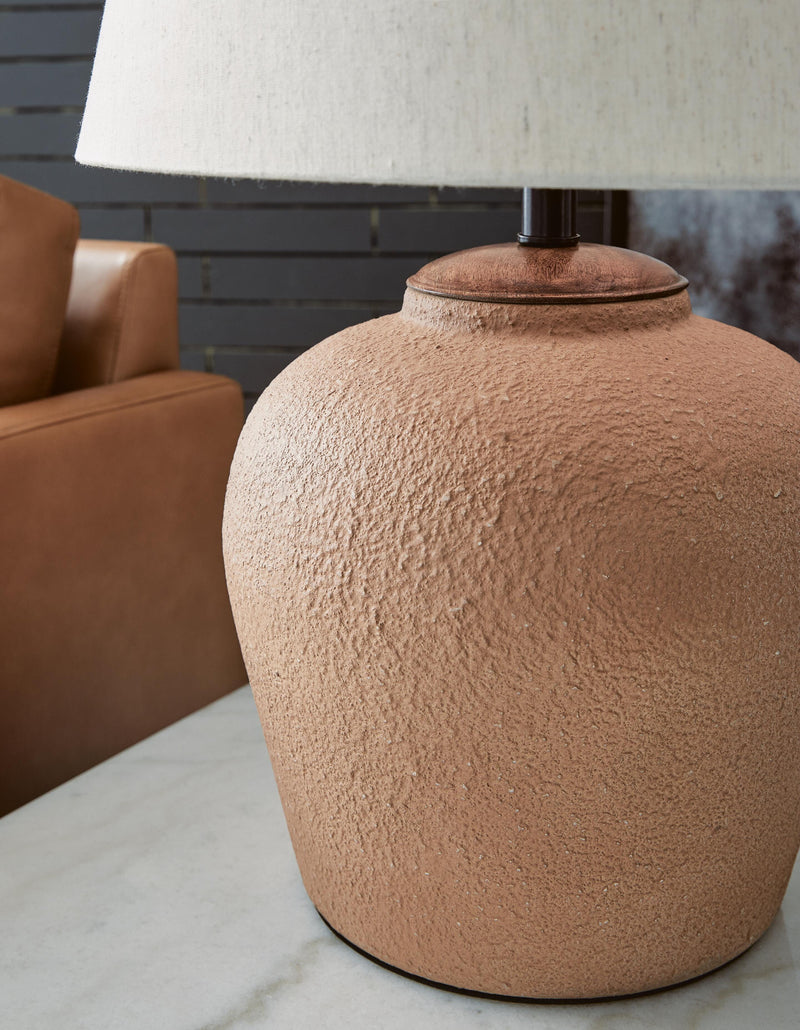 Ashley Furniture Scantor Lamp Set featuring two modern table lamps with fabric shades and sleek bases, perfect for living room decor.