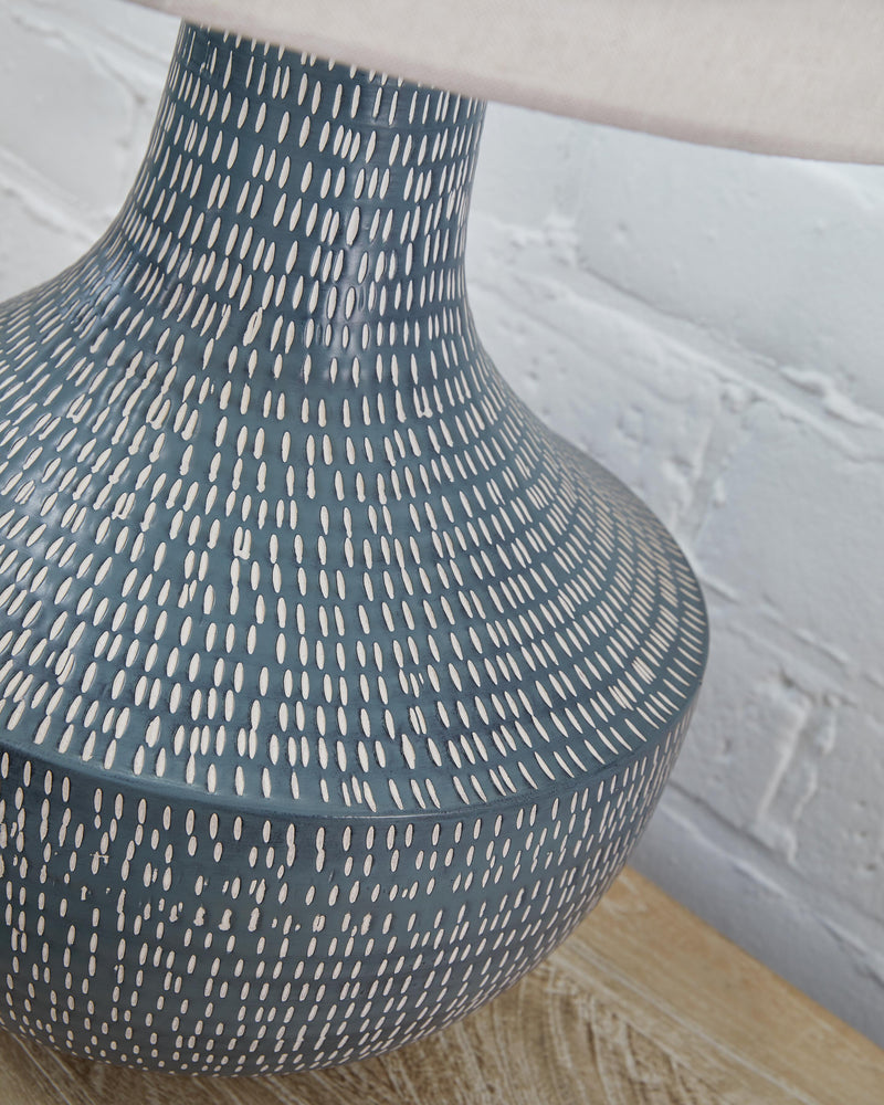 Ashley Furniture Schylarmont lamp set featuring two stylish table lamps with textured bases and fabric shades.