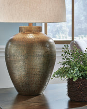 Ashley Furniture Madney Lamp Set with two stylish table lamps featuring neutral fabric shades and modern base designs.