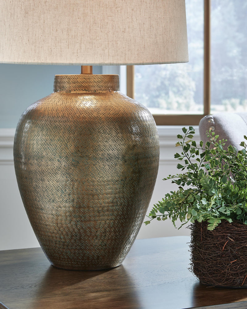 Ashley Furniture Madney Lamp Set with two stylish table lamps featuring neutral fabric shades and modern base designs.