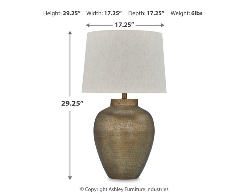 Madney Table Lamp Set by Ashley Furniture featuring two stylish ceramic lamps with fabric shades on a wooden table.