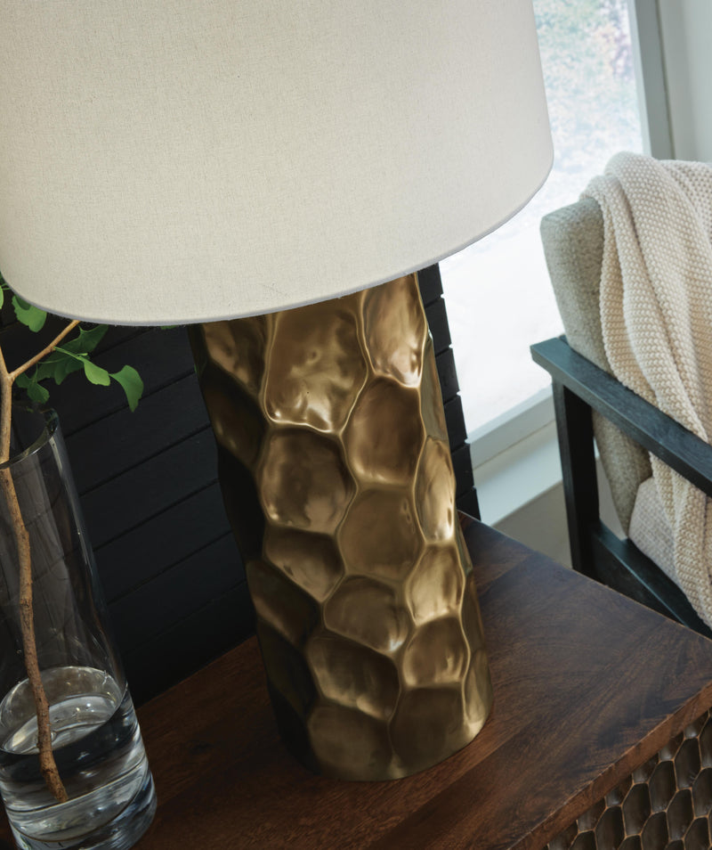 Ashley Furniture Marshawn table lamp with a sleek base and fabric shade, perfect for modern living room decor.