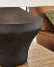 Dolanham table lamp by Ashley Furniture with a sleek base and fabric shade, ideal for home lighting and decor.