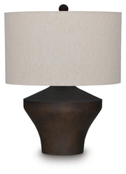 Ashley Furniture Dolanham table lamp with a sleek base and fabric shade, perfect for adding style to any living space.