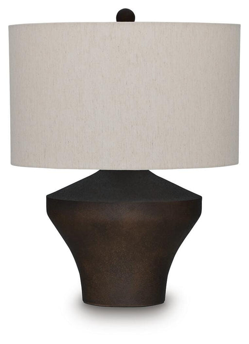 Ashley Furniture Dolanham table lamp with a sleek base and fabric shade, perfect for adding style to any living space.
