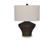 Ashley Furniture Dolanham table lamp with a sleek design, featuring a beige fabric shade and a stylish metal base.