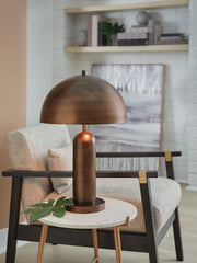 Ashley Furniture Wendfield table lamp with a sleek base and fabric shade, perfect for enhancing home decor.