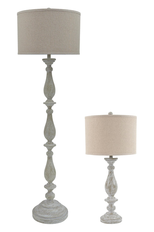 Set of two Ashley Furniture Bernadate floor lamps with sleek, modern design featuring white shades and dark metal bases.